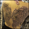 Wings Pistols and Roses Tattoo Zindy